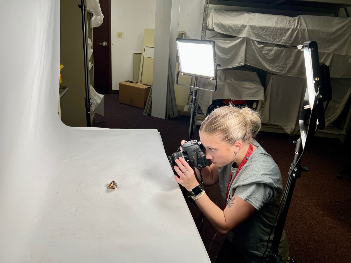 BGSU alumna photographing a ring.