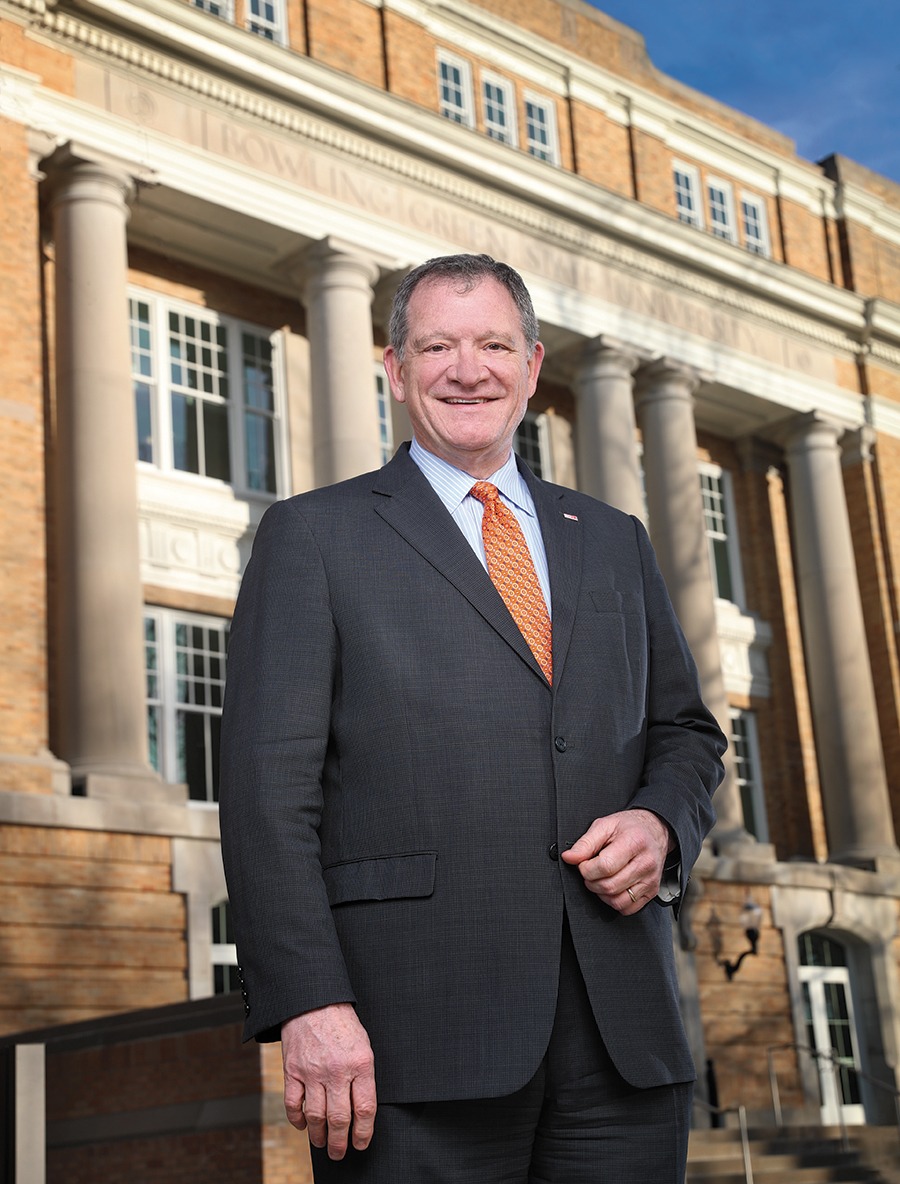 President Rodney Rogers in front of University Hall