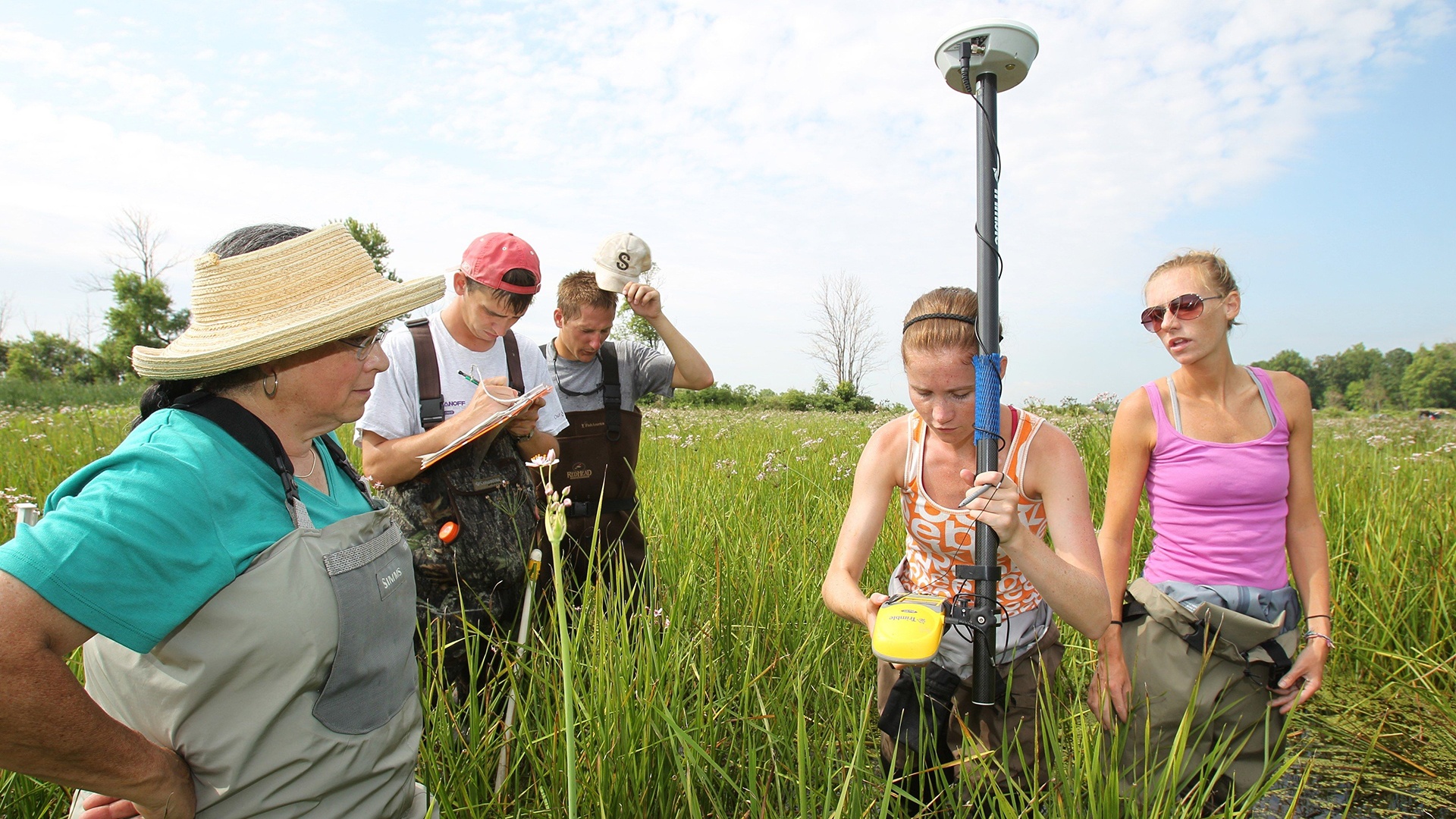 Ohio freshwater marshes are explored by BGSU biology major students with GPS locators and marine sample collection kits.