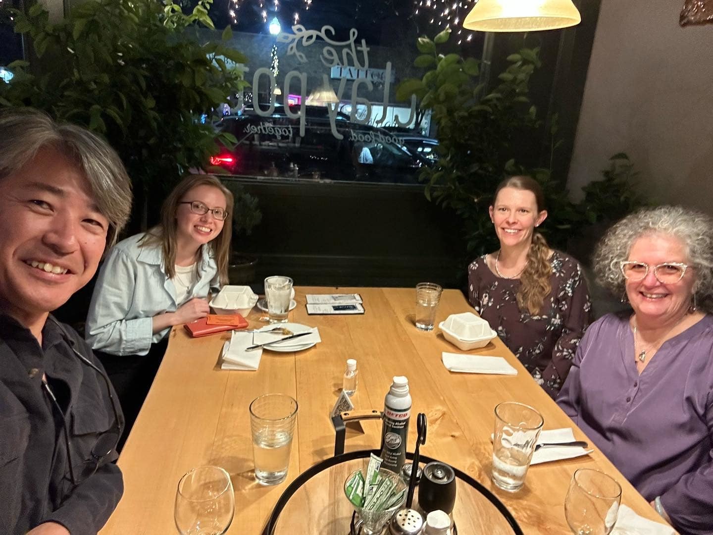  A photo of Paul Kei Matsuda having dinner with T/ESOL and UWP faculty at Clay Pot. Left to right: Paul Kei Matsuda, Anastasiia Kryzhanivska, Amy Cook, Lucinda Hunter