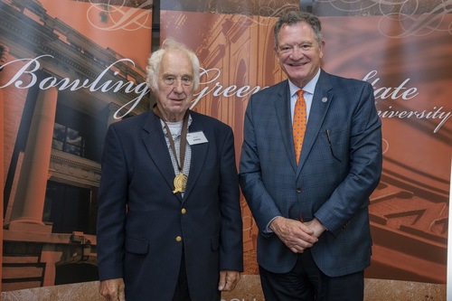 BGSU President Rodney K. Rogers with Golden Falcon award recipient.