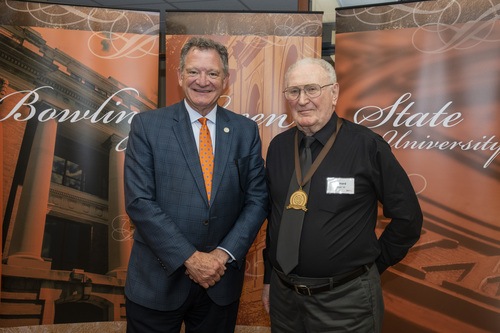 BGSU President Rodney K. Rogers with Golden Falcon award recipient.