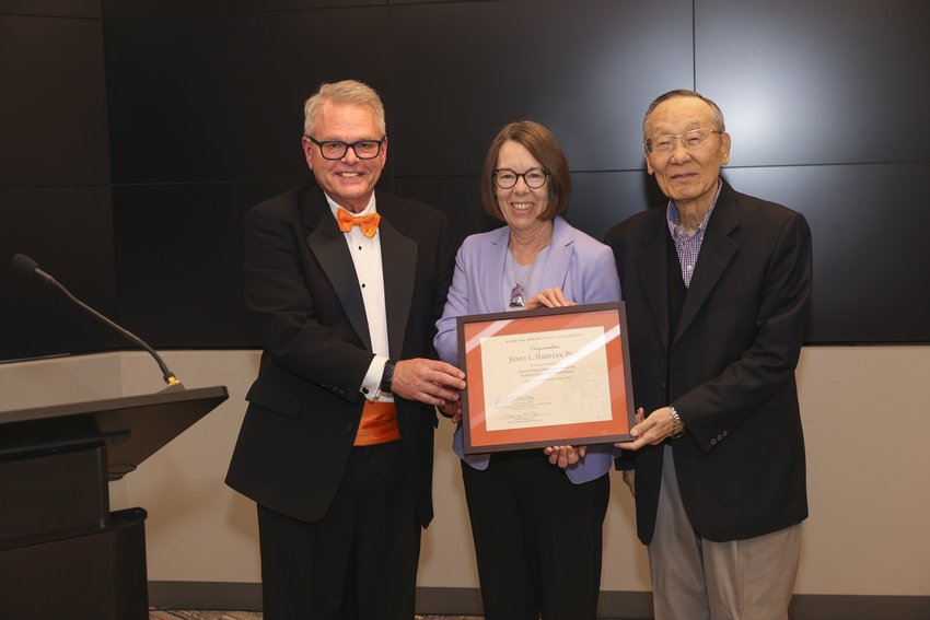 Schmidhorst College of Business Dean Raymond Braun, Associate Dean Dr. Janet Hartley and Dr. Chan Hahn pose together. 