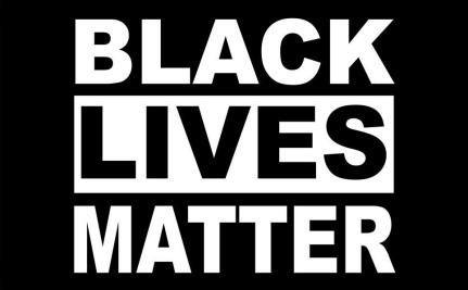 Black background with white lettering that reads "Black Lives Matter"