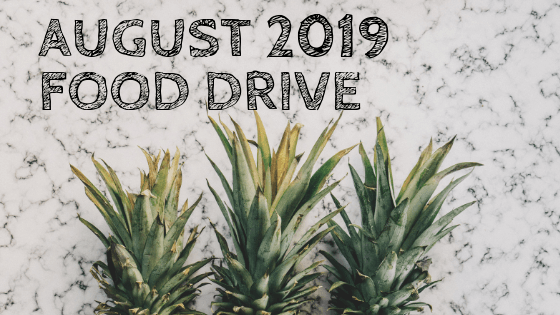 August 2019 Food Drive appears over an image of 3 pineapple tops on a black and white marbled background