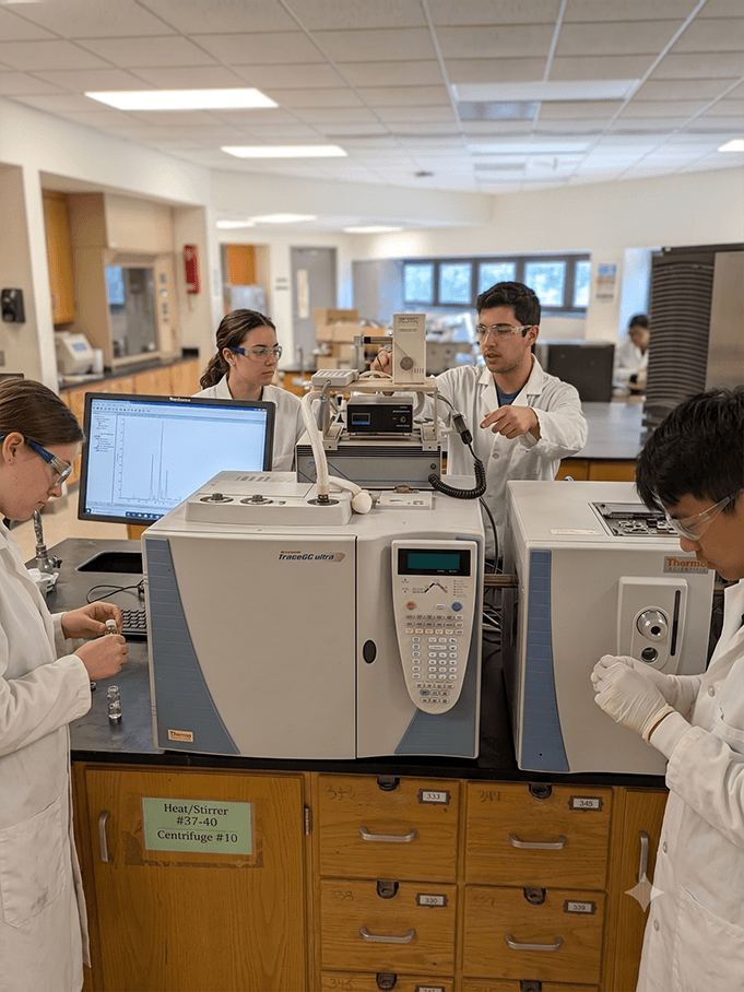 image of students using a GC-MS
