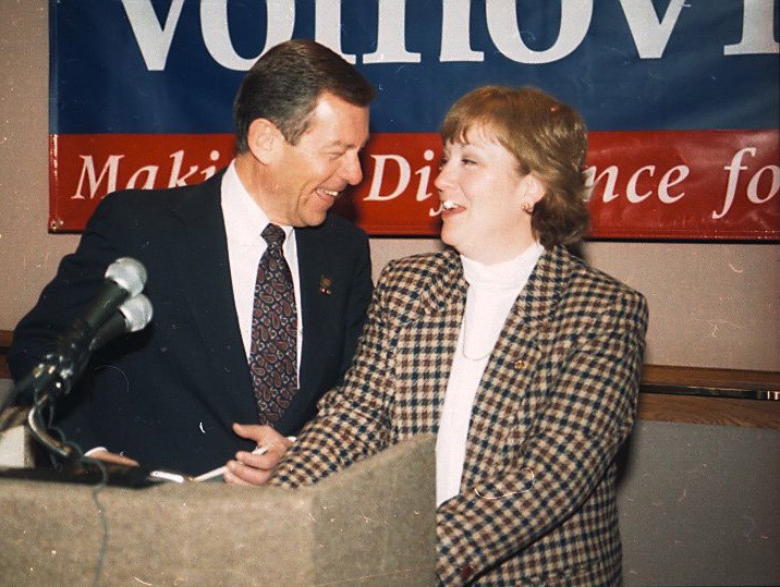 Nancy Hollister laughing with former Govenor George Voinovich