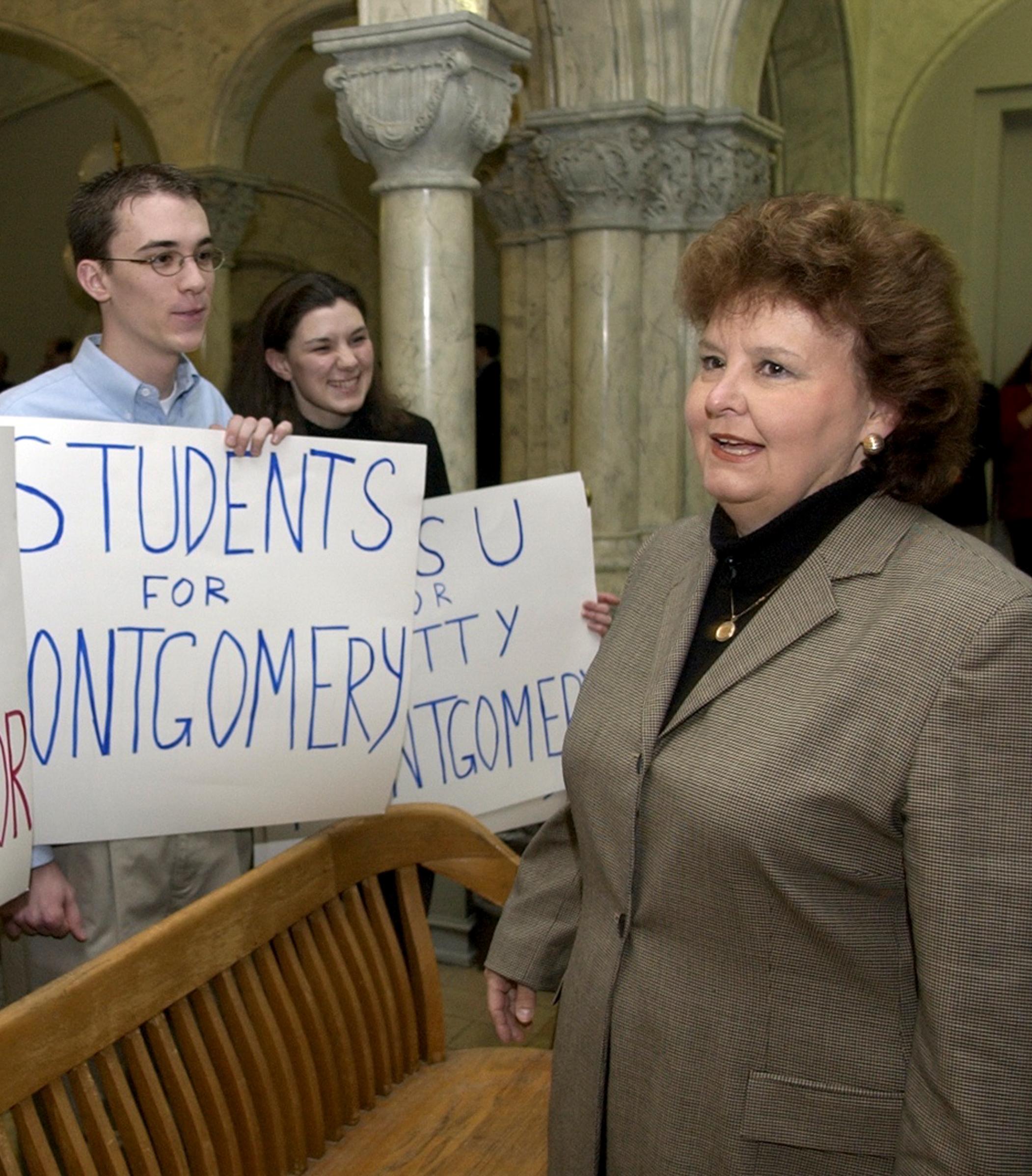PHOTO-Montgomery-2002-3-5-students-holding-signs-MERLIN-221571-cropped