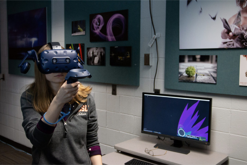 photo of a student working in the AR/VR lab