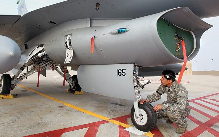 Air force student mechanic on plane