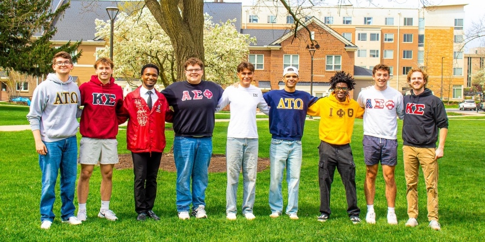 group of students passing out blankets