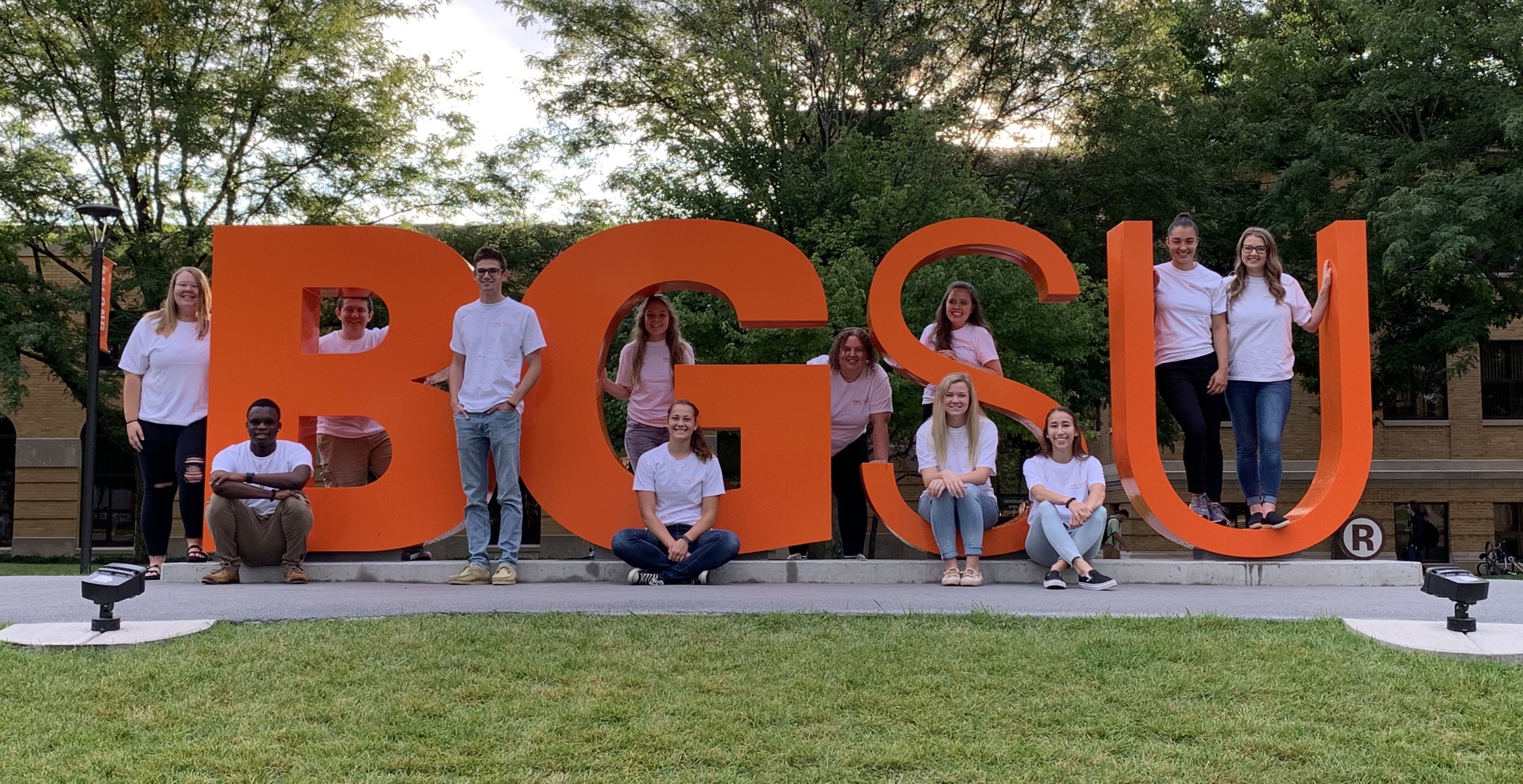 Fall 2019 Research Assistants for the Police Integrity Research Group posing at the BGSU letters.