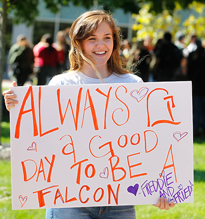 Girl-with-sign-always-a-good-day-to-be-a-falcon