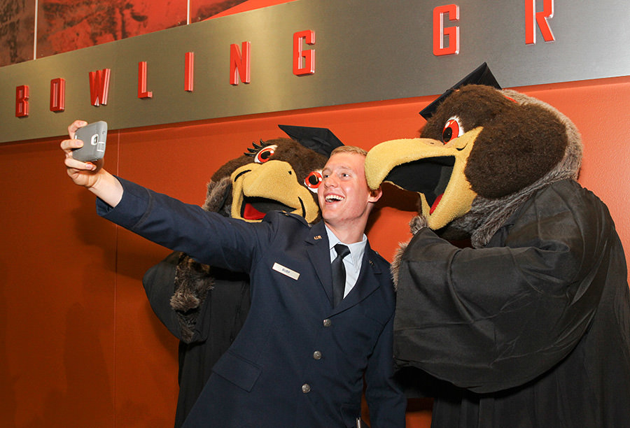 A selfie with Freddie and Frieda Falcon following commencement ceremonies.