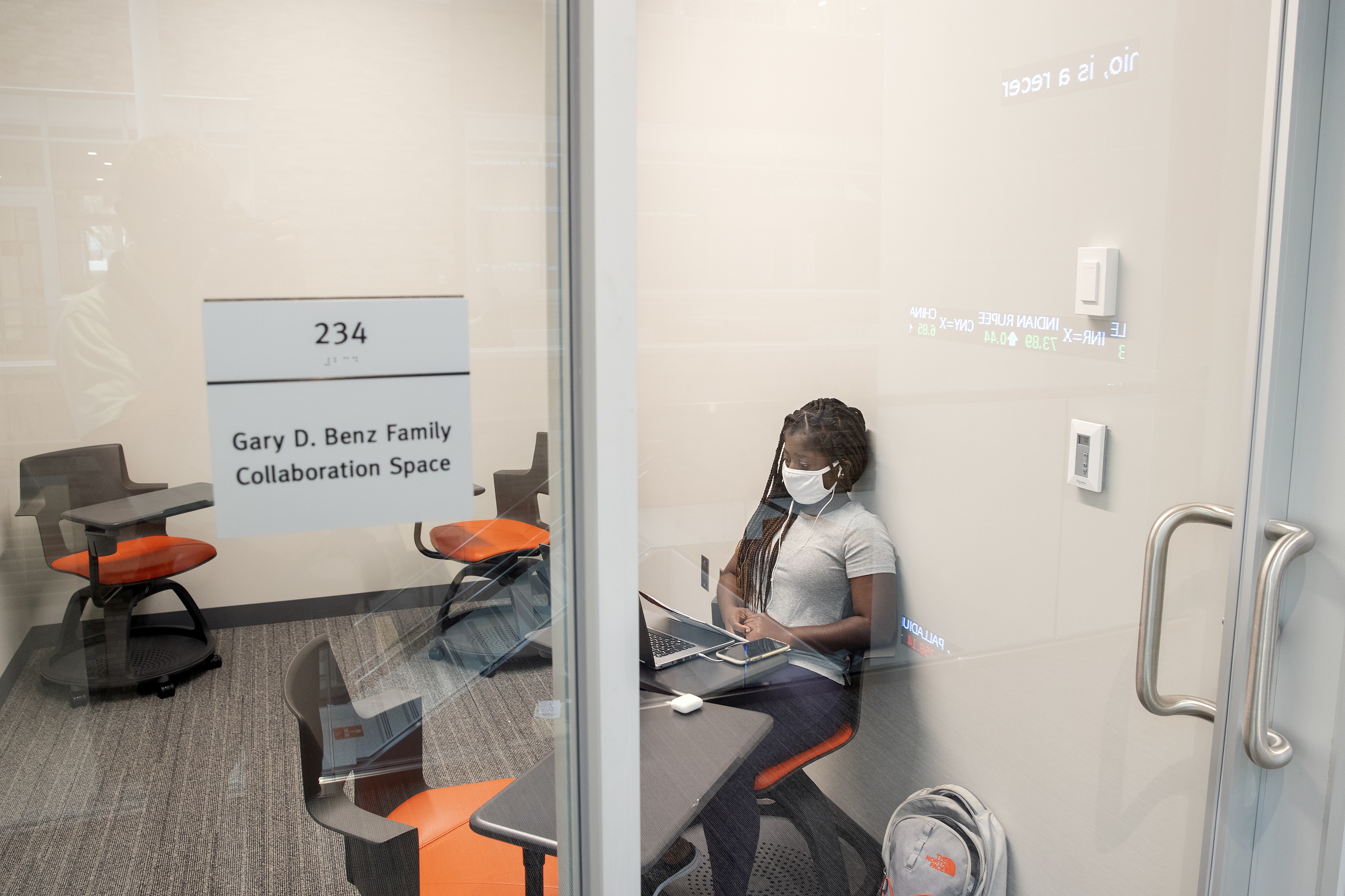 Helena Aidoo, a senior accounting and international business major from Columbus, Ohio studies in the Gary D. Benz Family Collaboration Space.