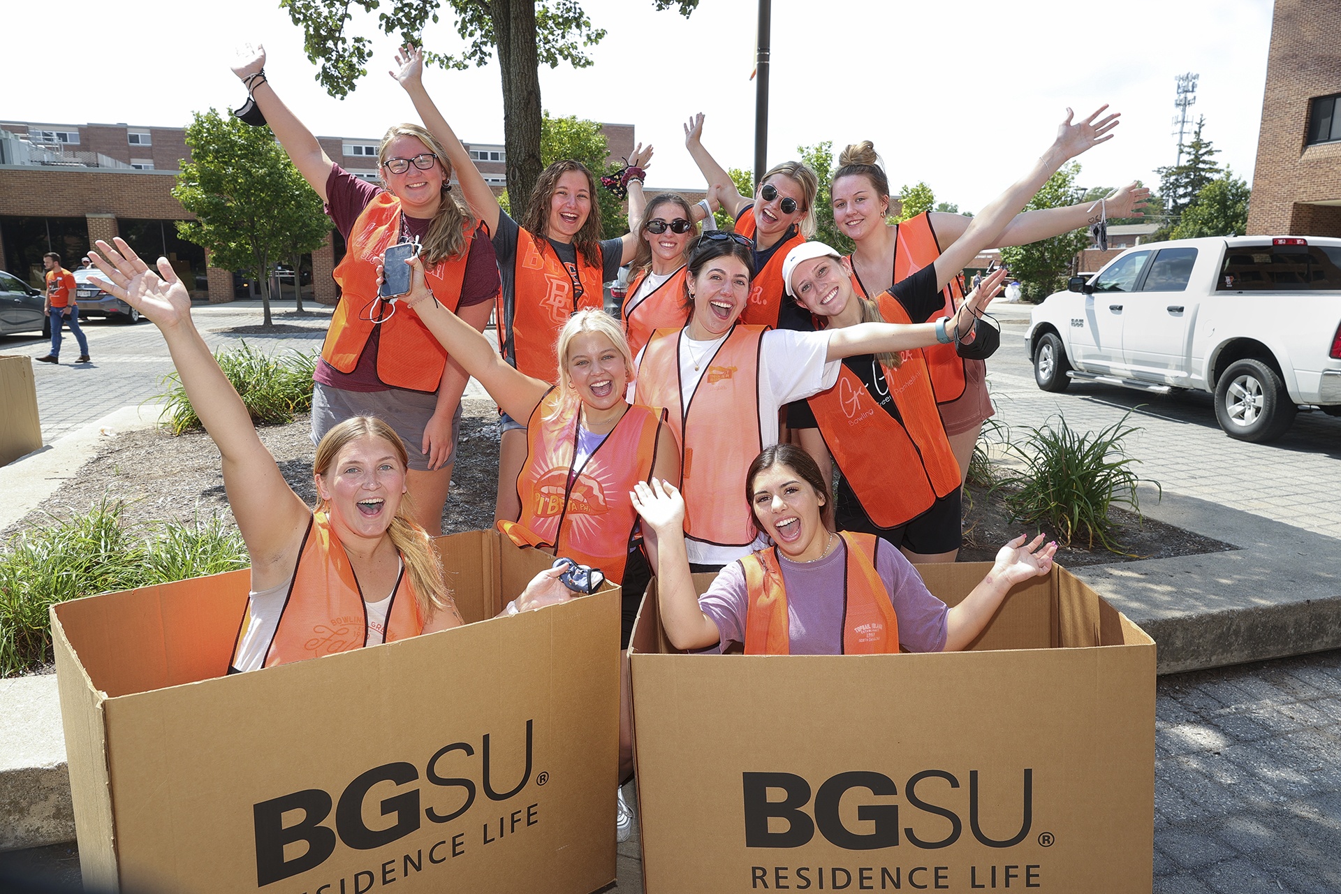 Move-in volunteers welcome new and returning students to their residence halls.