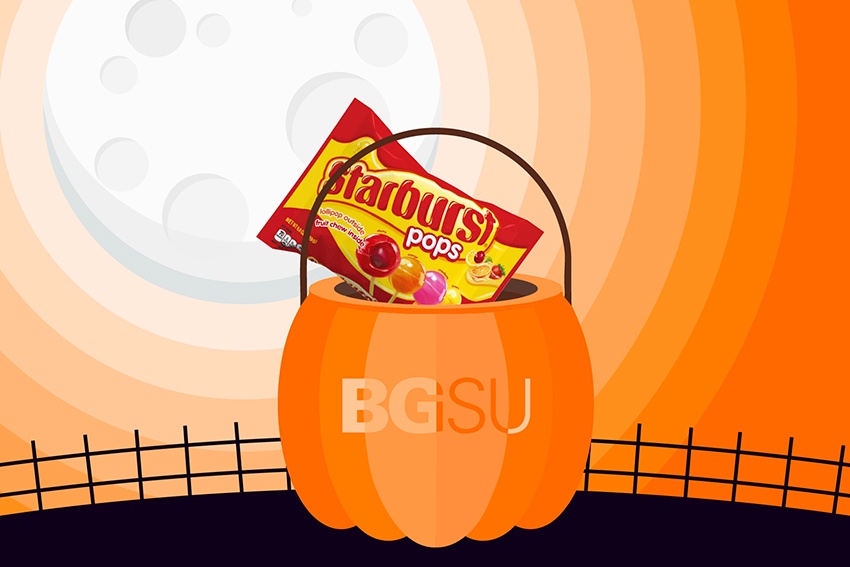 Starburst pops candy in a bgsu pumpkin candy bucket