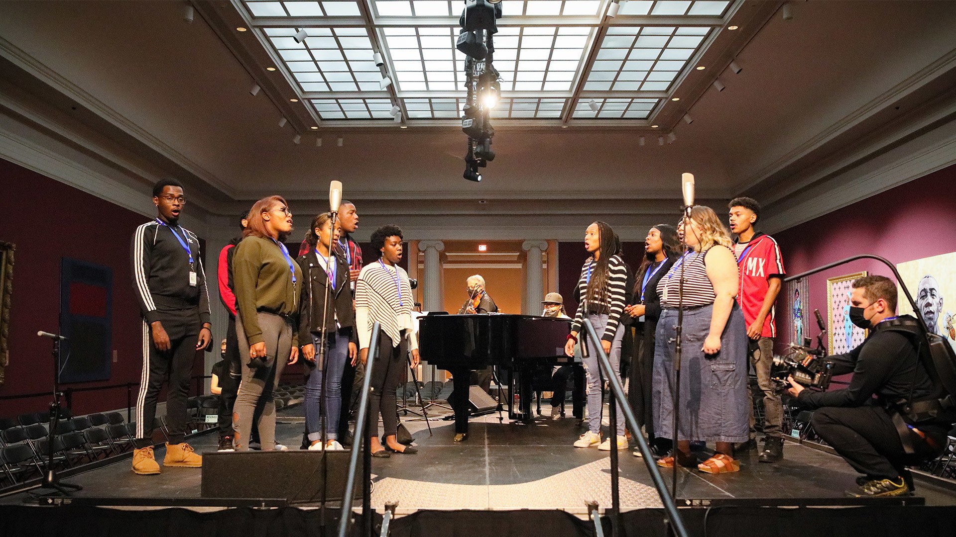 BGSU Voices practice singing in the Toledo Museum 