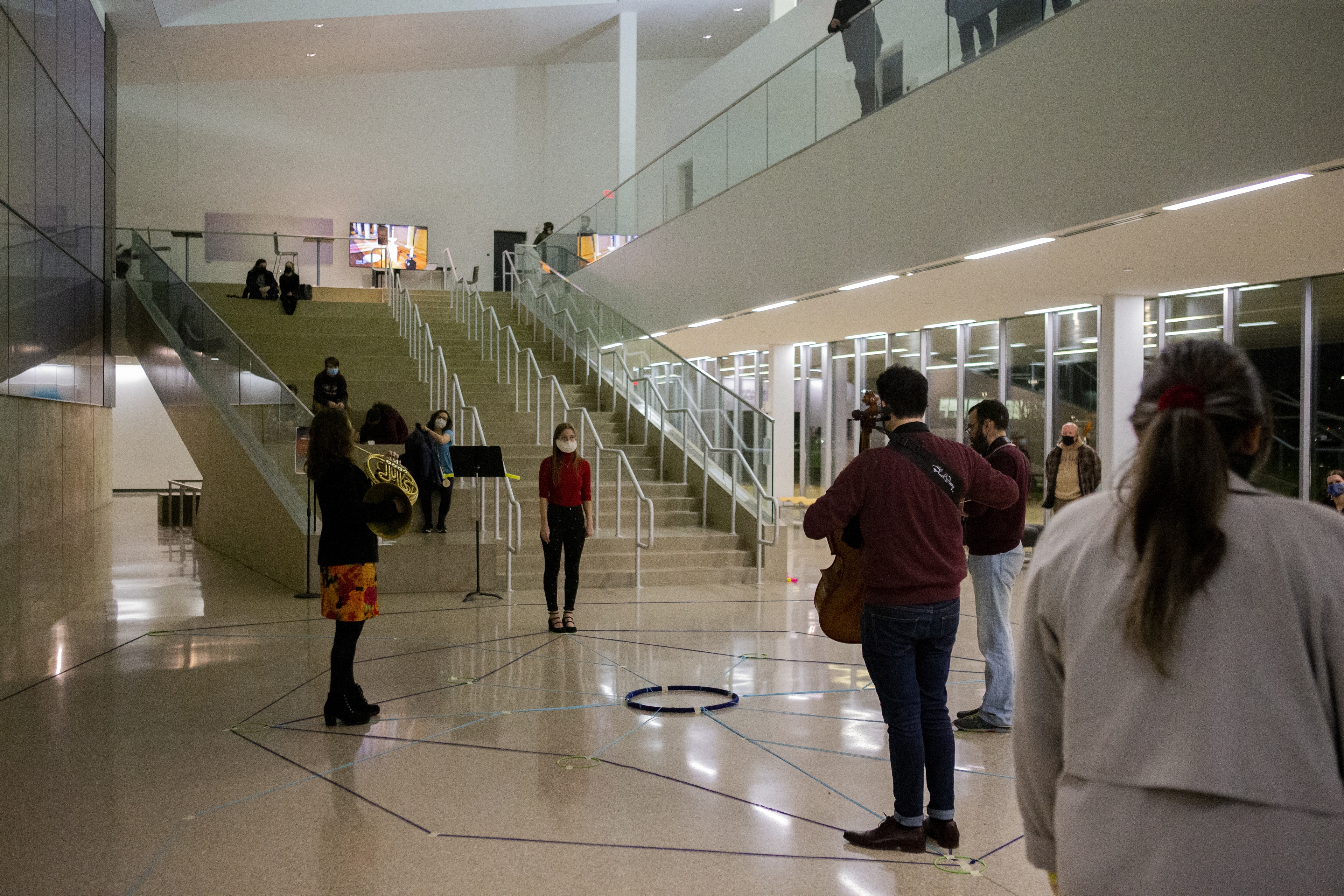 Artists perform in the foyer of the Wolfe Center For The Arts