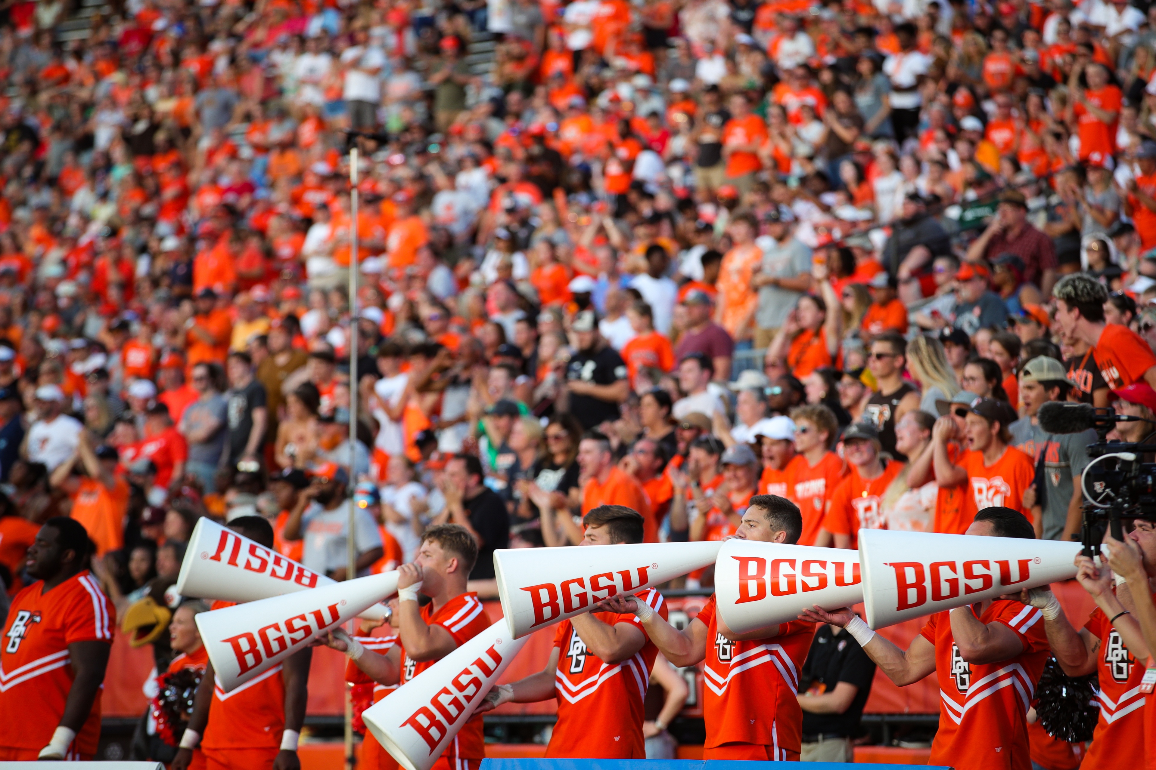 BGSU cheer team leads fans at the homecoming football game