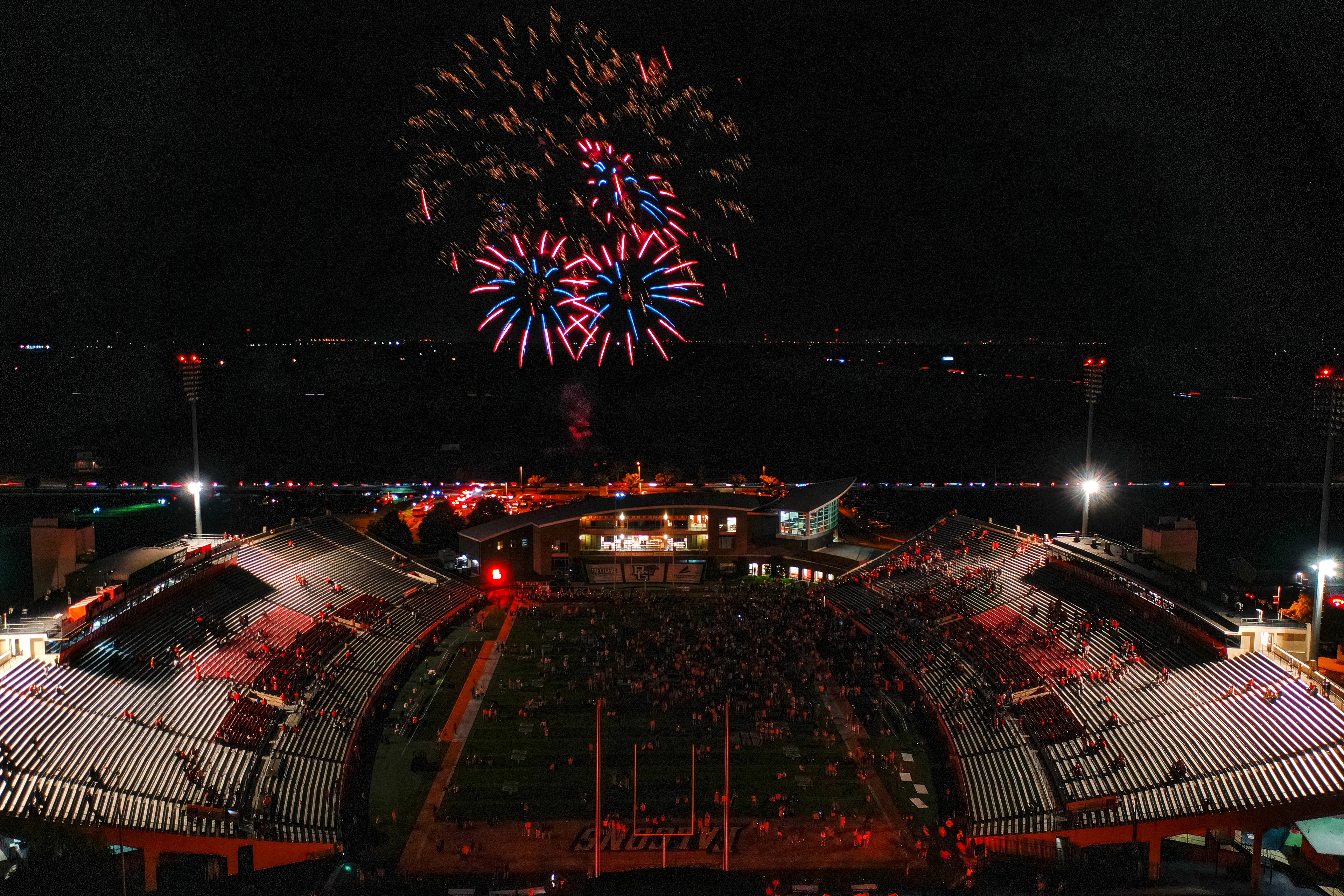 Fireworks thunder overhead at Doyt L. Perry stadium to cap off the 100th homecoming.