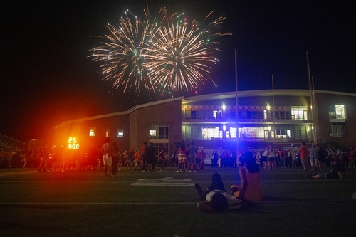 Fireworks explode over the football stadium