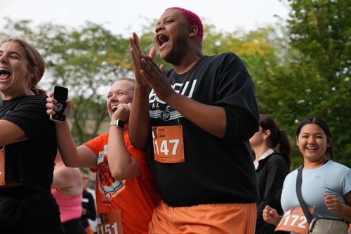 A person cheers during a race