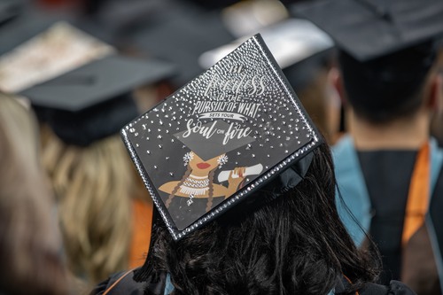 Graduation cap reads, "Be fearless in the pursuit of what sets your soul on fire" 