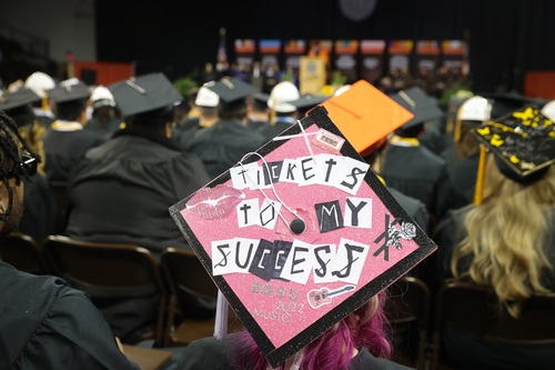 Graduation cap reads, "Tickets to my success - Music"   