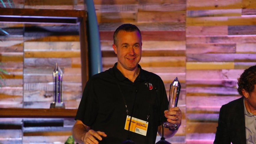 Mike Nutter '96 accepts Minor League Baseball's Executive of the Year Award at the Winter Meetings in San Diego. Nutter, a sport management graduate of BGSU, is the president of the Fort Wayne TinCaps, the single-A affiliate of the San Diego Padres.