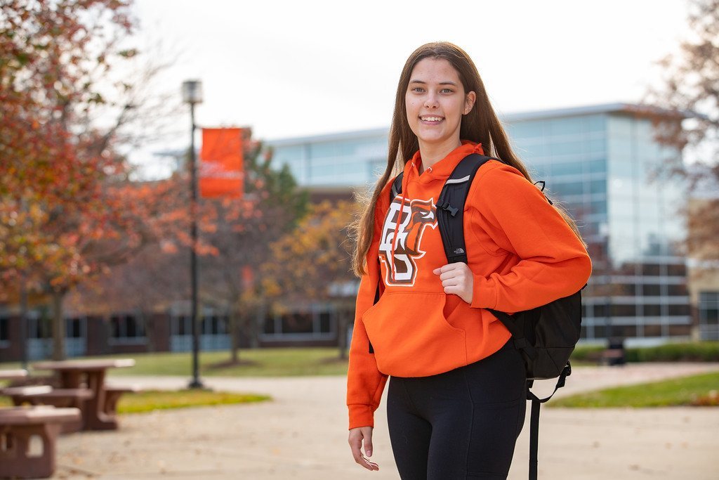 BGSU Firelands student Kaeley Schonhardt carries a backpack on campus