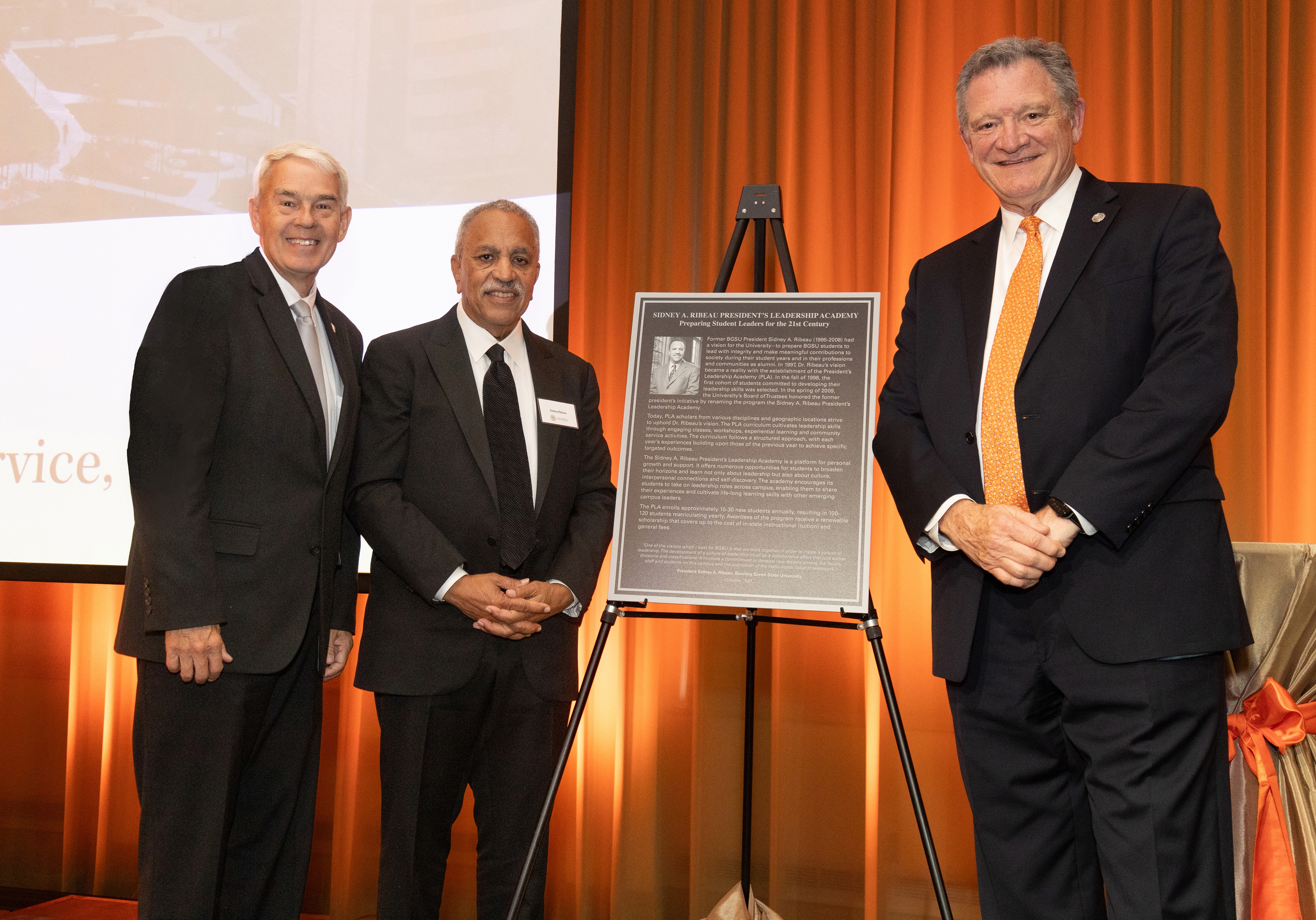 Ohio Department of Higher Education Chancellor Randy L. Gardner and President Rodney K. Rogers join Dr. Ribeau on stage during the anniversary dinner.(BGSU photo)