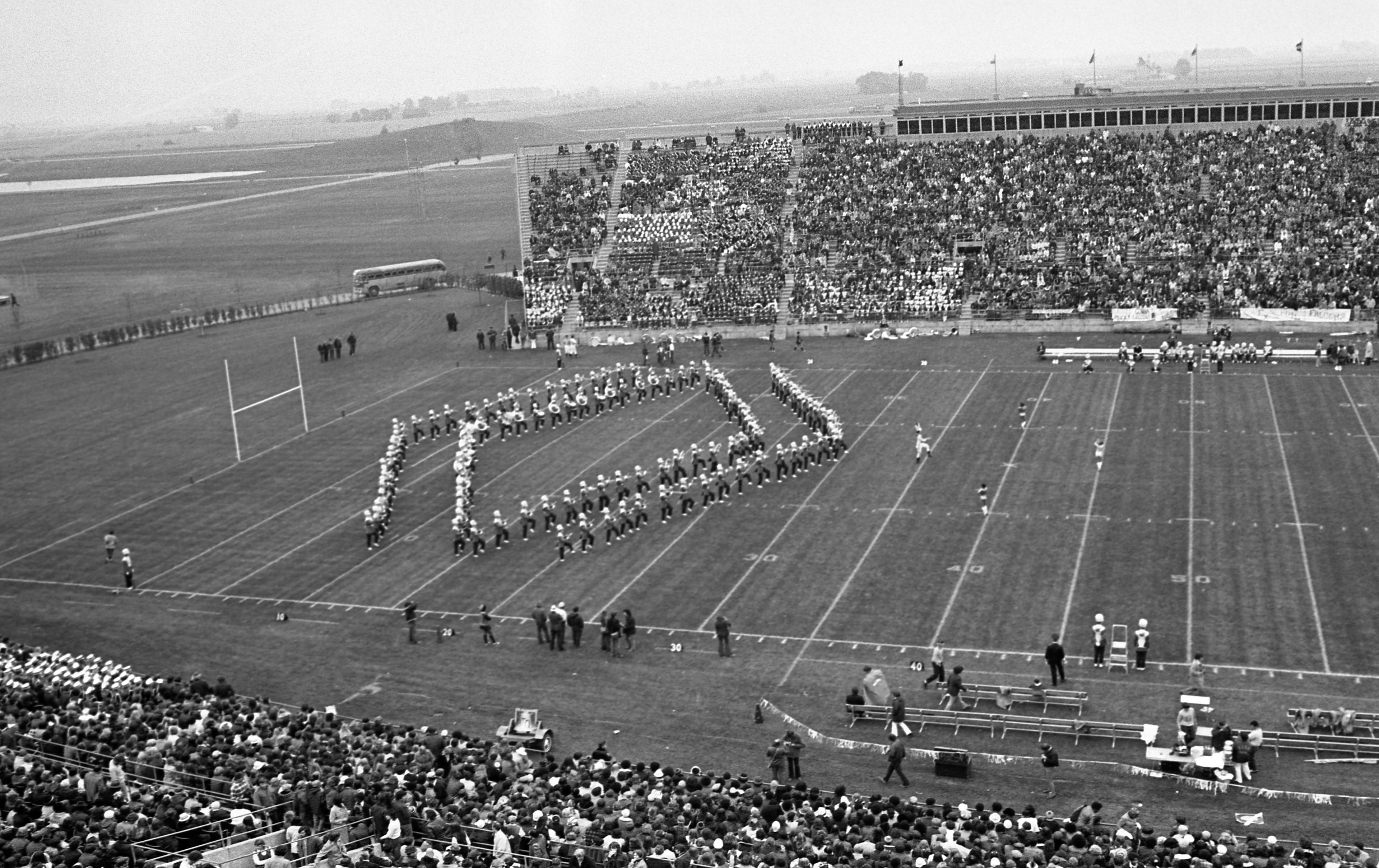 Falcon Marching Band marches in a diamond formation at Doyt L. Perry Stadium during a 1960 football game
