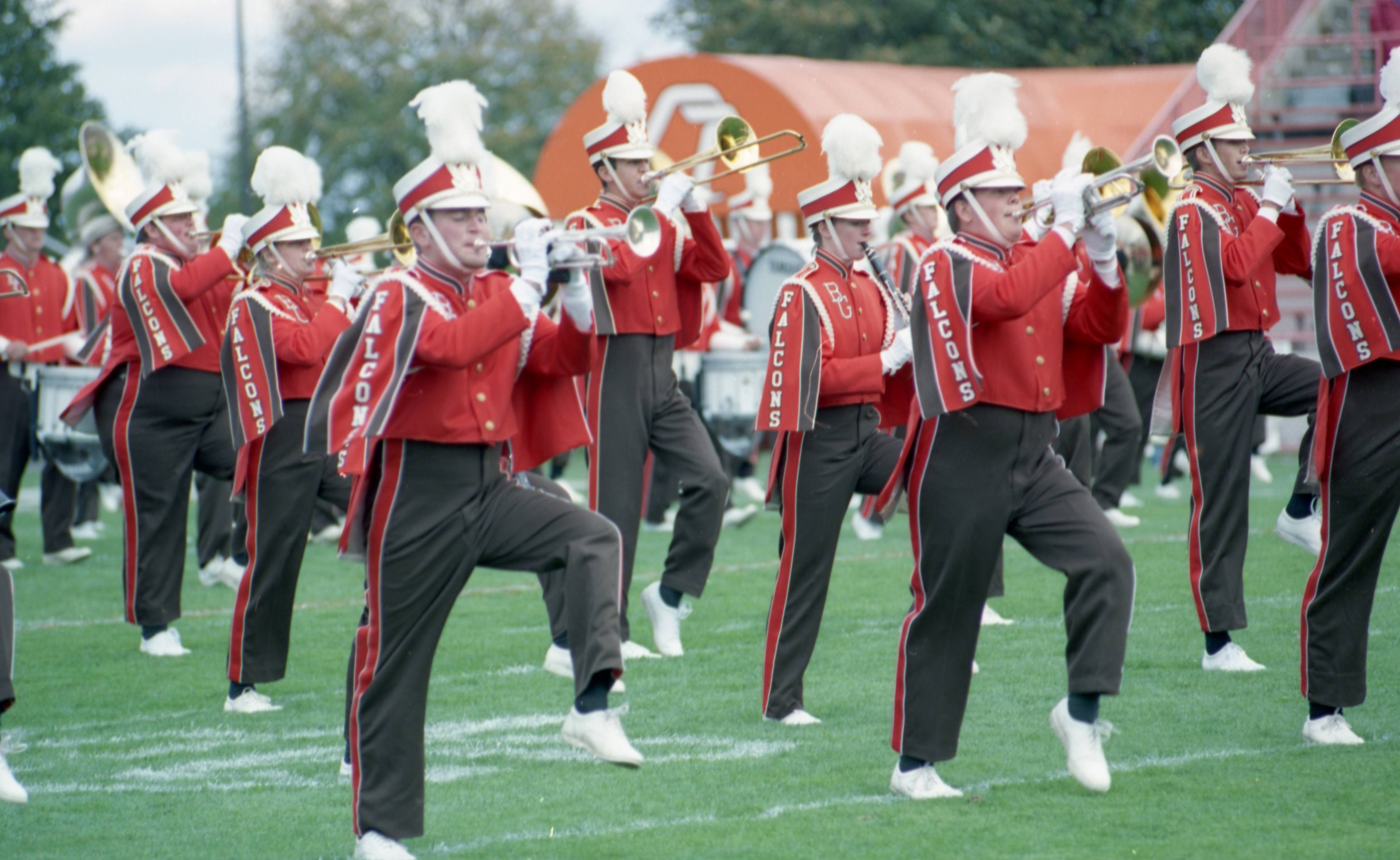 Band members perform a pregame routine at Doyt L. Perry Stadium