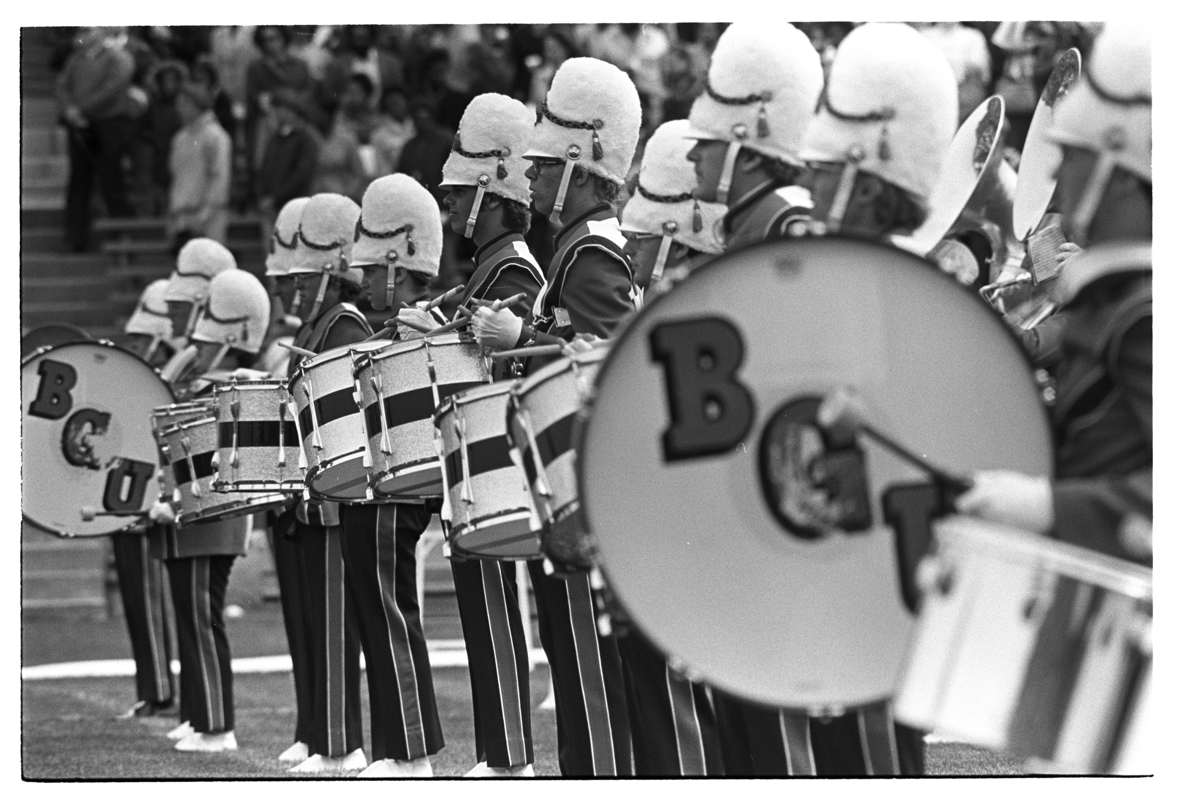 Drummers play during the 1980s at a BGSU halftime show 