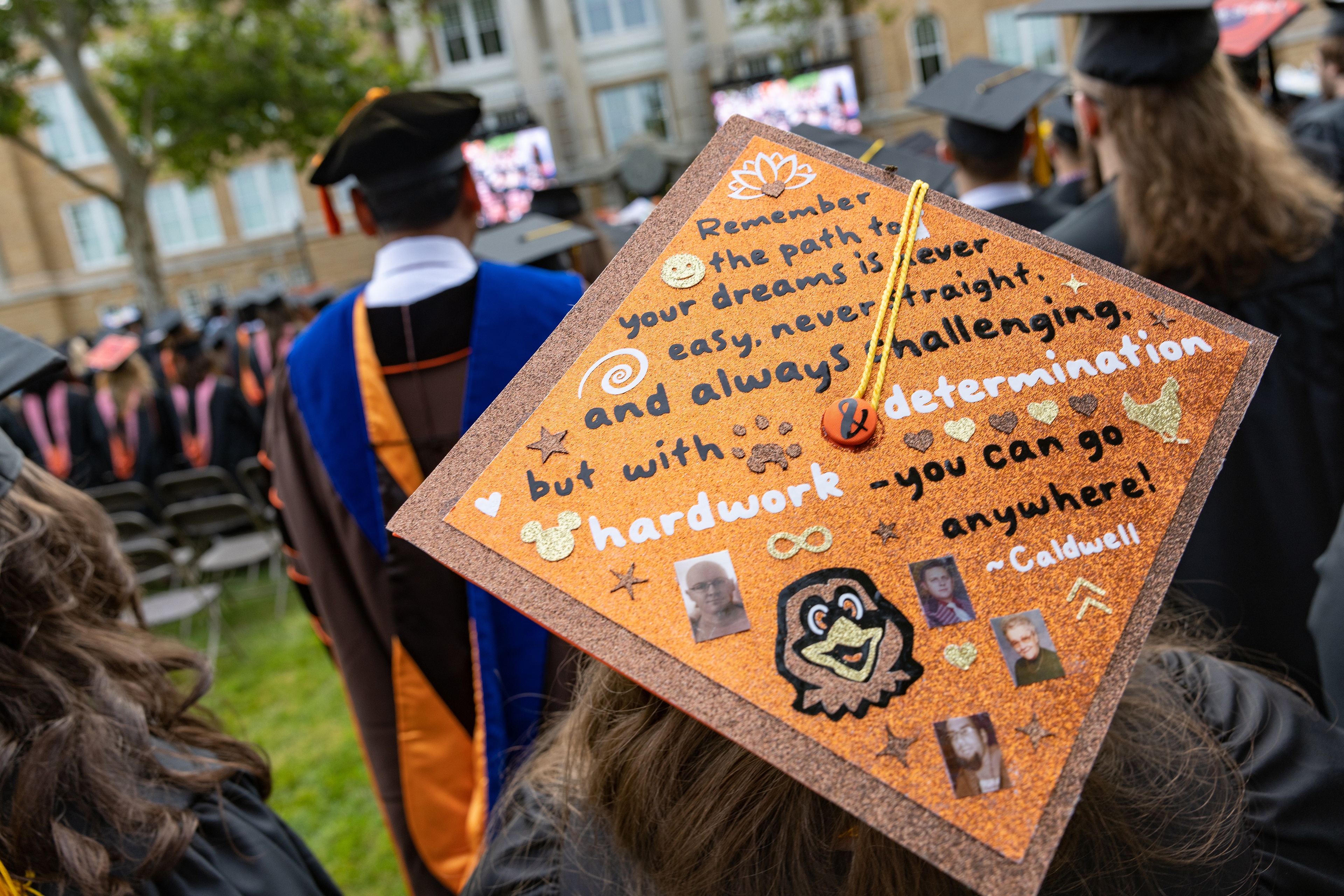 Graduation cap says “Remember the path to your dream is never easy, never straight, and always challenging. But with determination and hard work, you can go anywhere! - Caldwell"