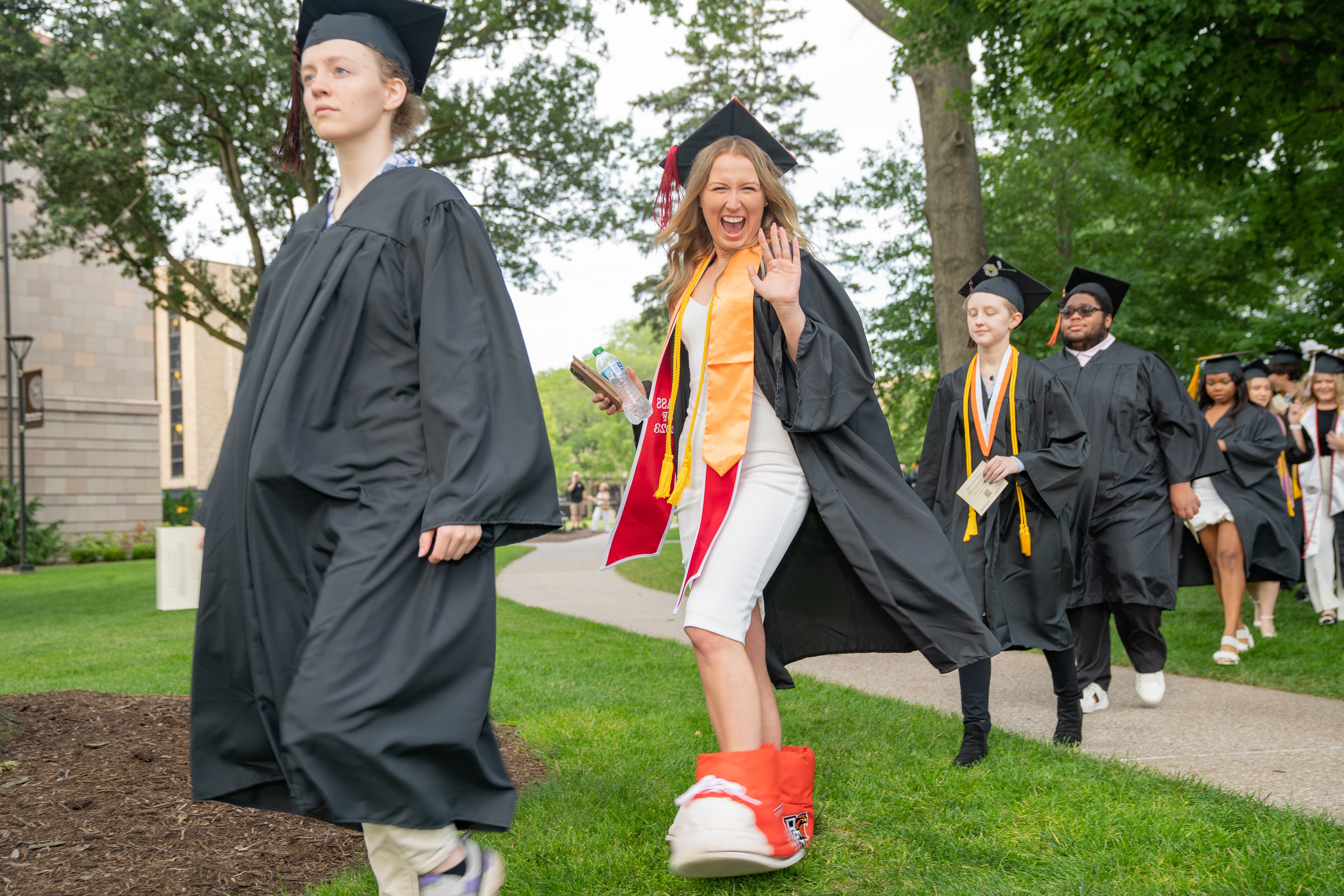 Graduate Alison Kaiser wears large Frieda Falcon shoes 
