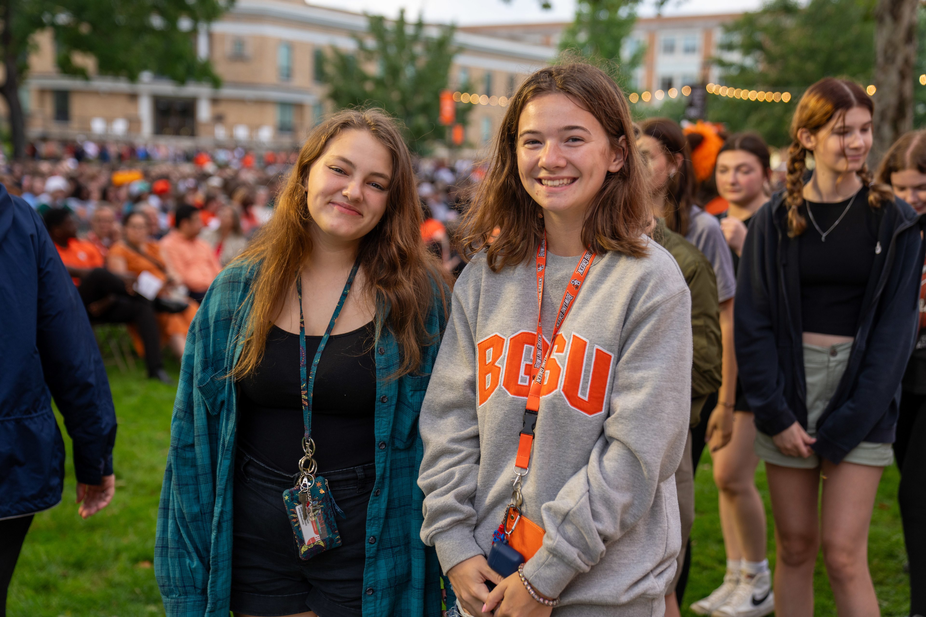Two students smile while at BGSU Convocation.