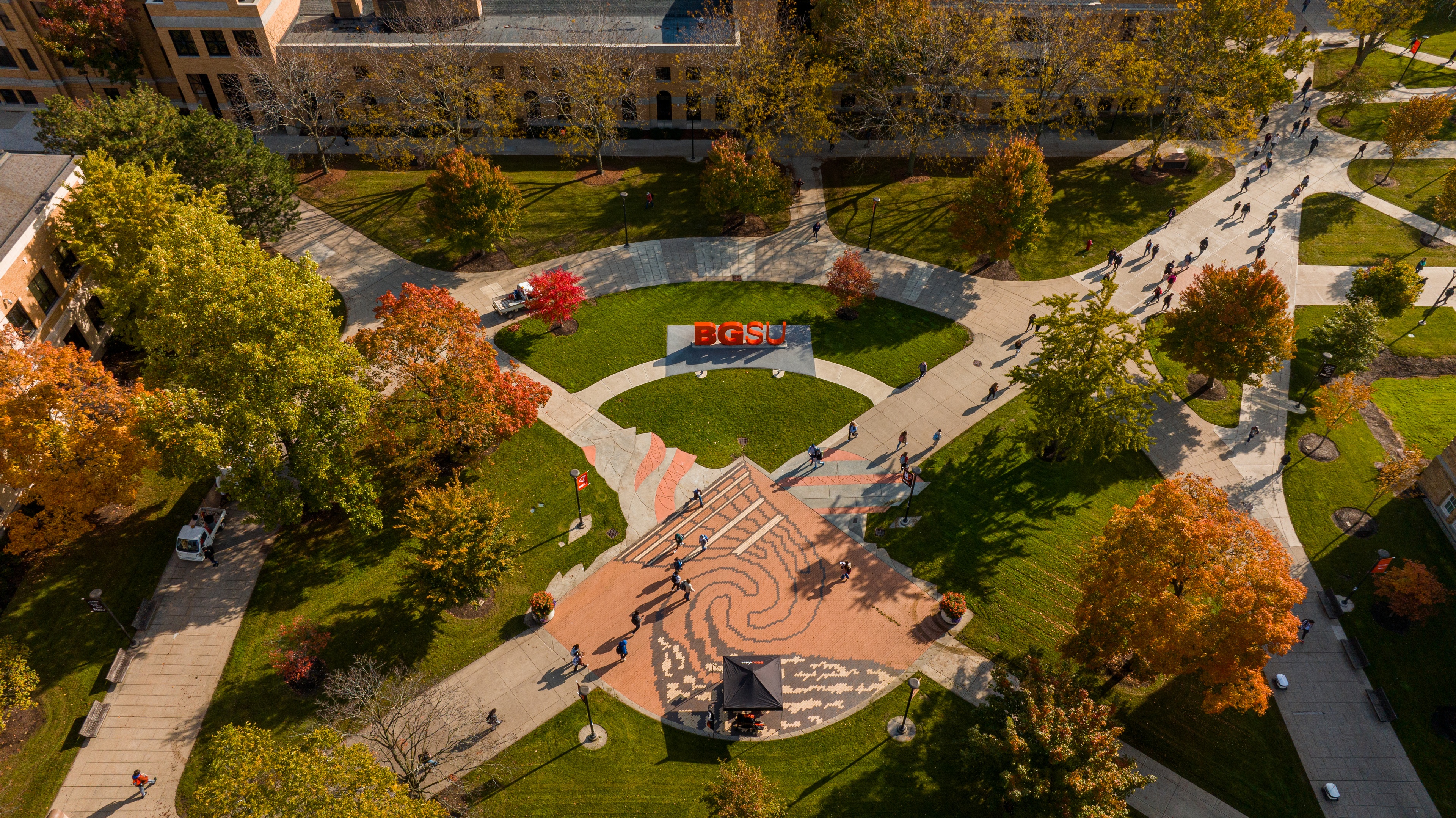 An aerial view of the BGSU letters and the oval during autumn