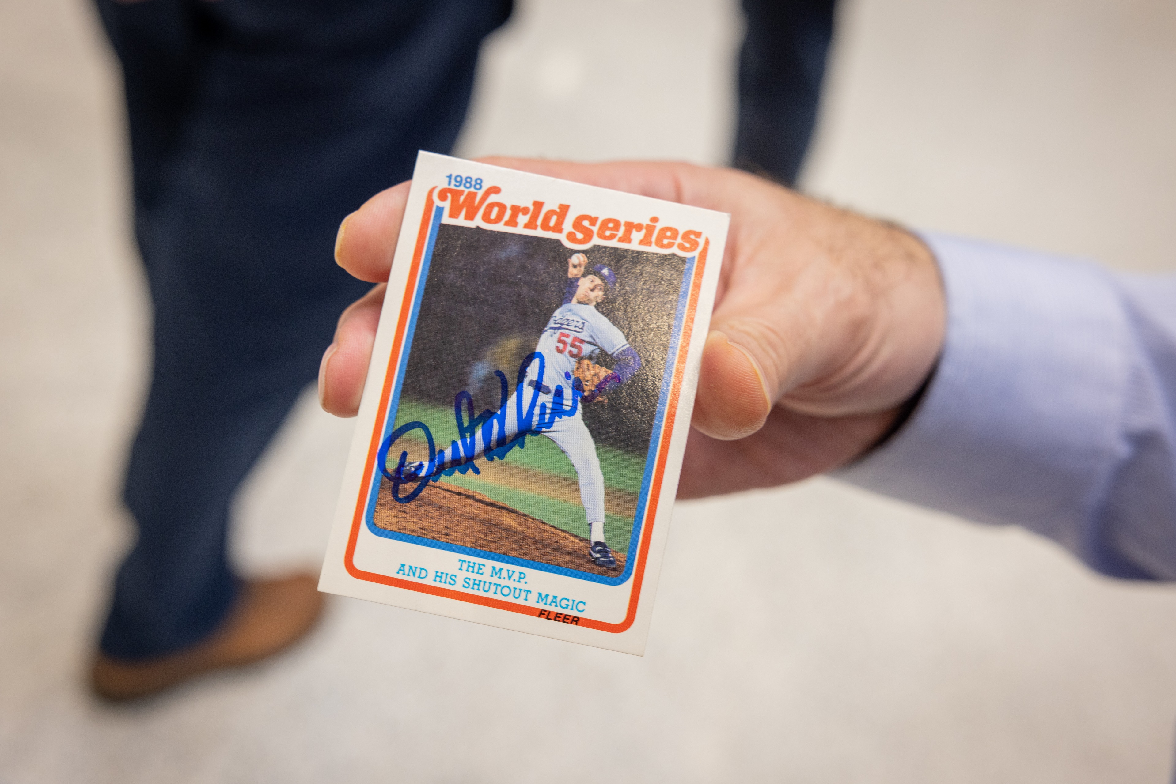 A signed baseball card shows Orel Hershiser during the 1988 World Series.