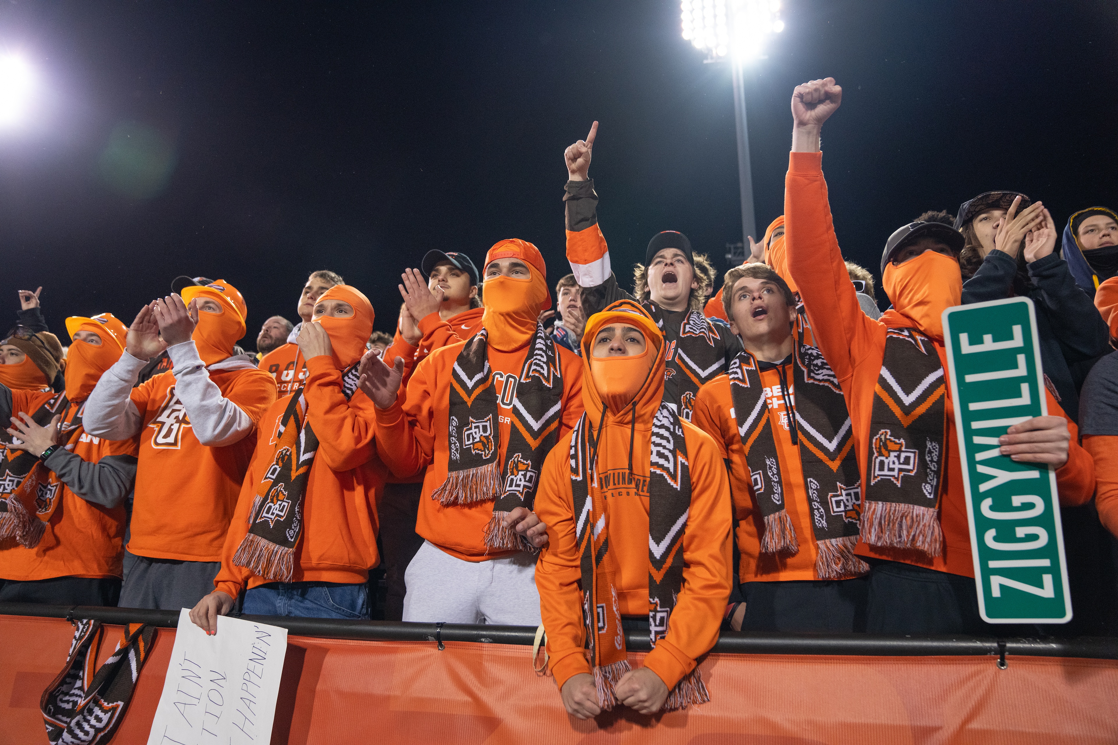 BGSU fans all wearing orange cheer at Doyt L. Perry Stadium 