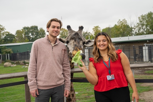 Danny Baroudi and Libby Bumb are two of the six BGSU students working at the Toledo Zoo as part of a unique fellowship program. (BGSU photo/Haven Conn '22) 