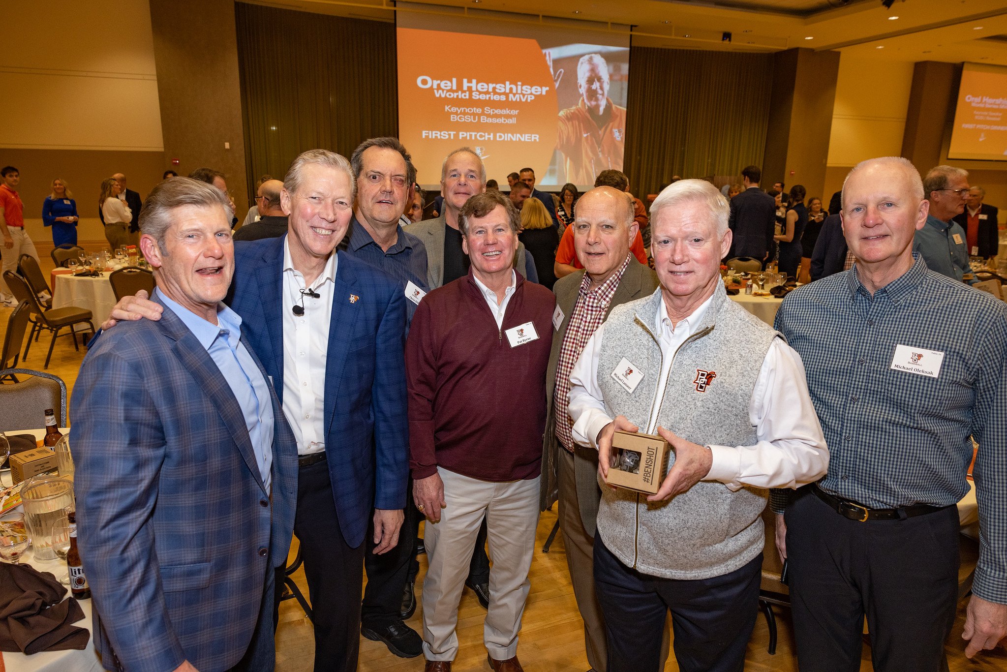 Former BGSU baseball players stand with Orel Hershiser at the Baseball First Pitch dinner.