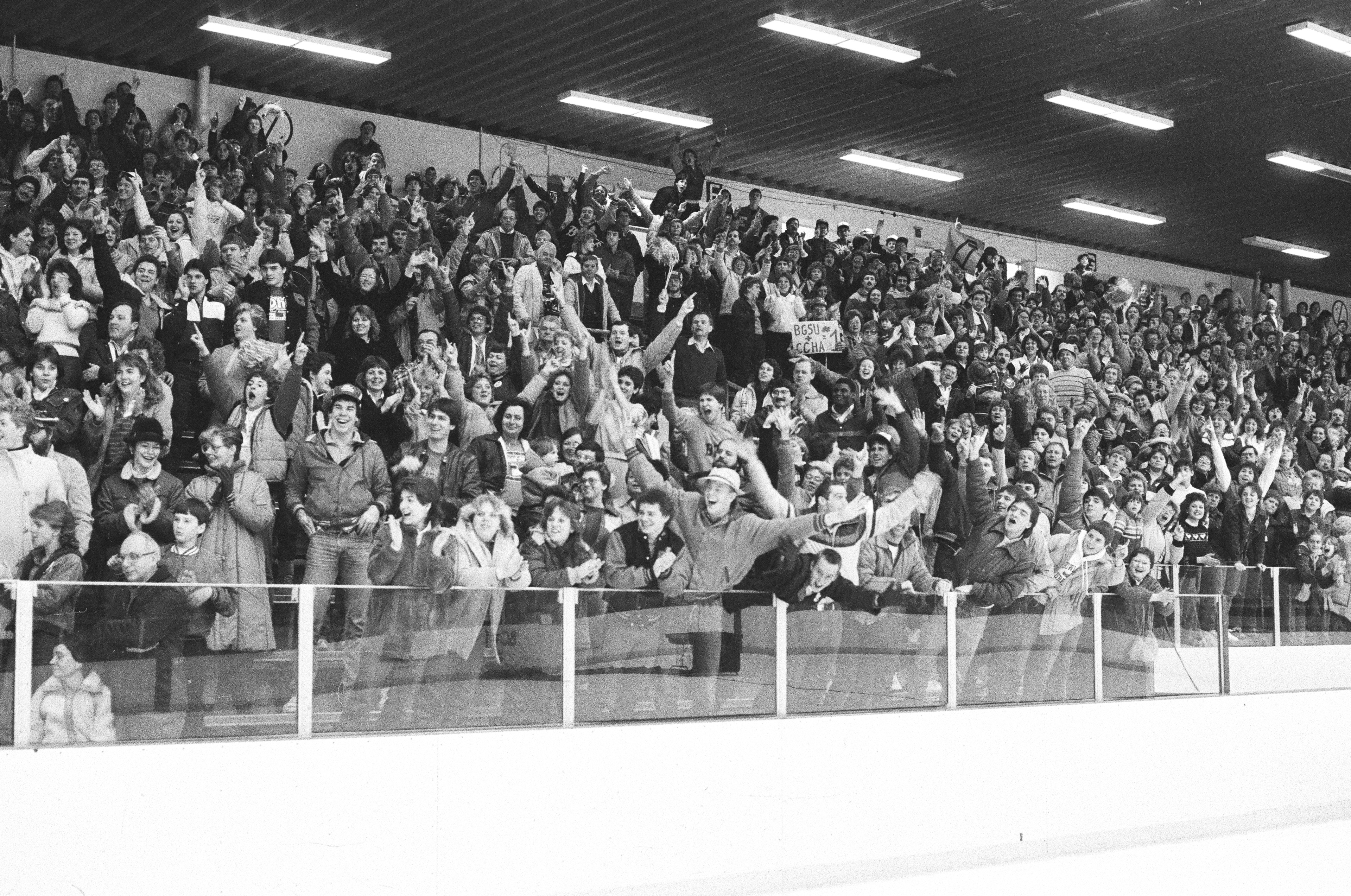 Fans celebrate in a raucous atmosphere at what is now known as the Slater Family Ice Arena. 