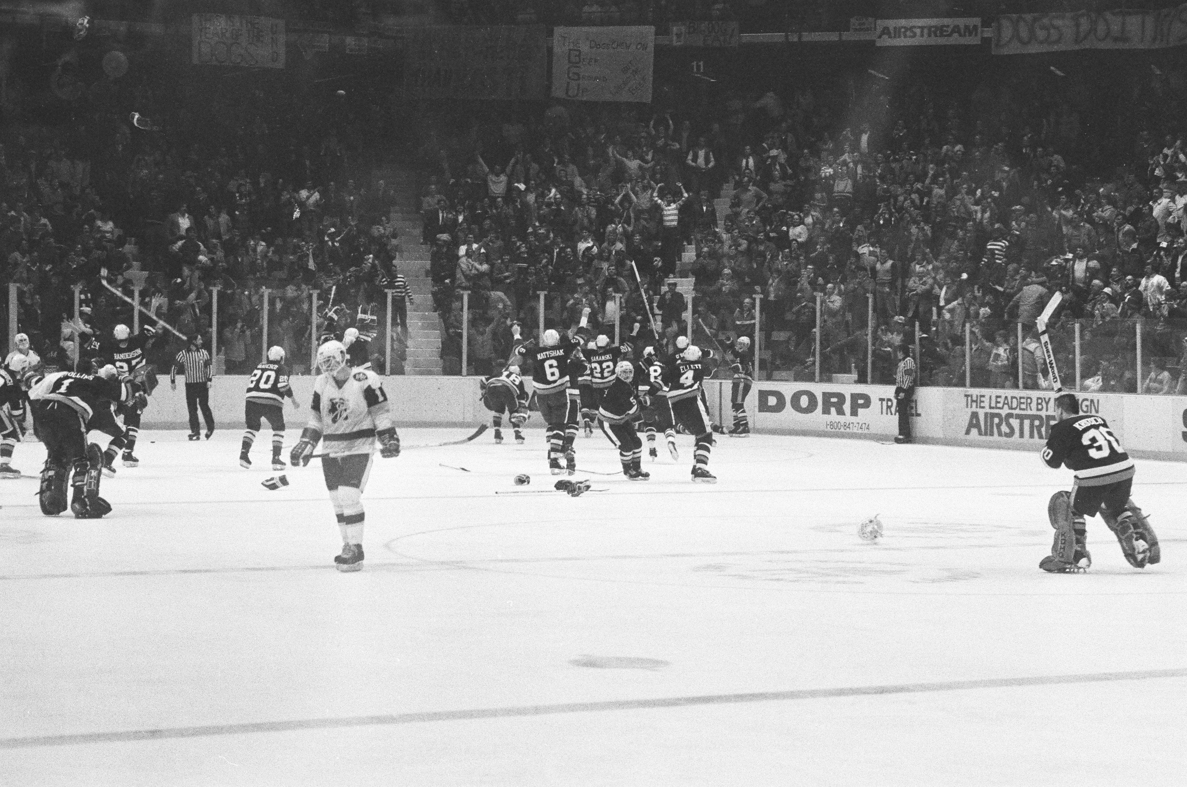 Bowling Green State University hockey players celebrate on the ice after winning the 1984 national championship.