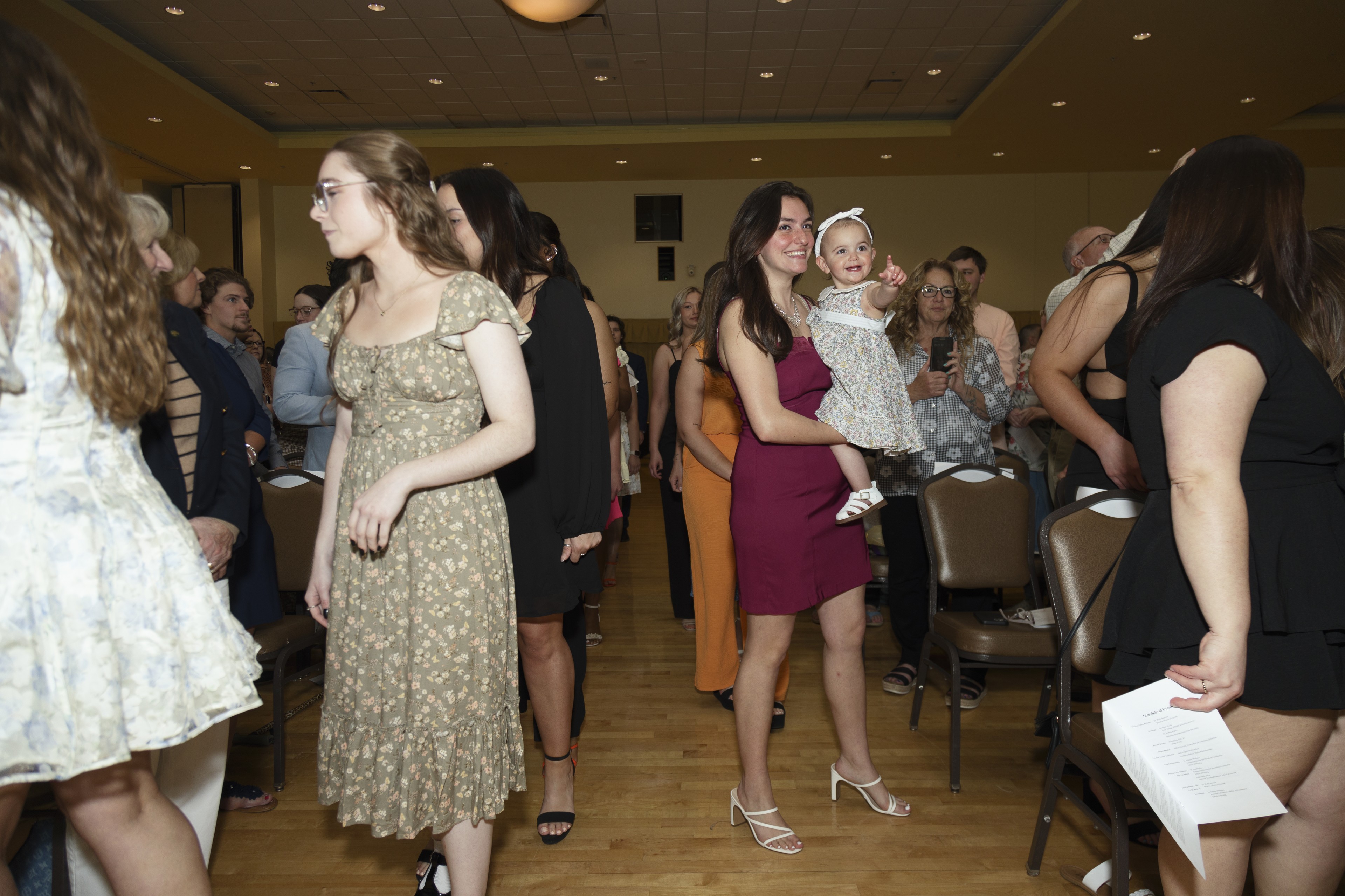 Nursing students walk into the Lenhart Grand Ball Room 