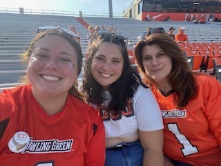 From left: Leah Krul, Halina Krul and Cindy Krul attend a BGSU football game.