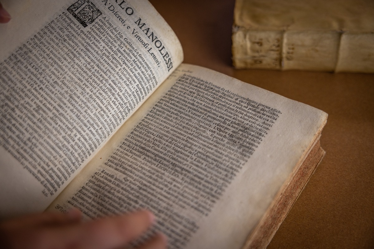 A book is laid open on a table