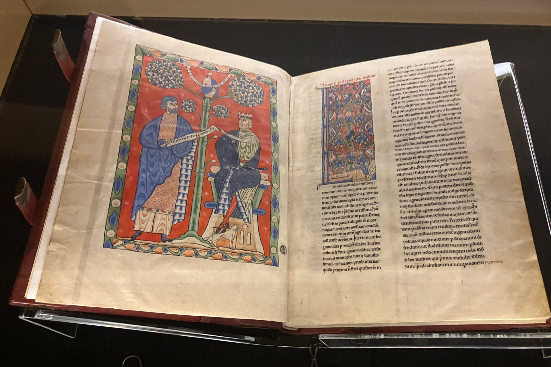 A book lays open in a display case