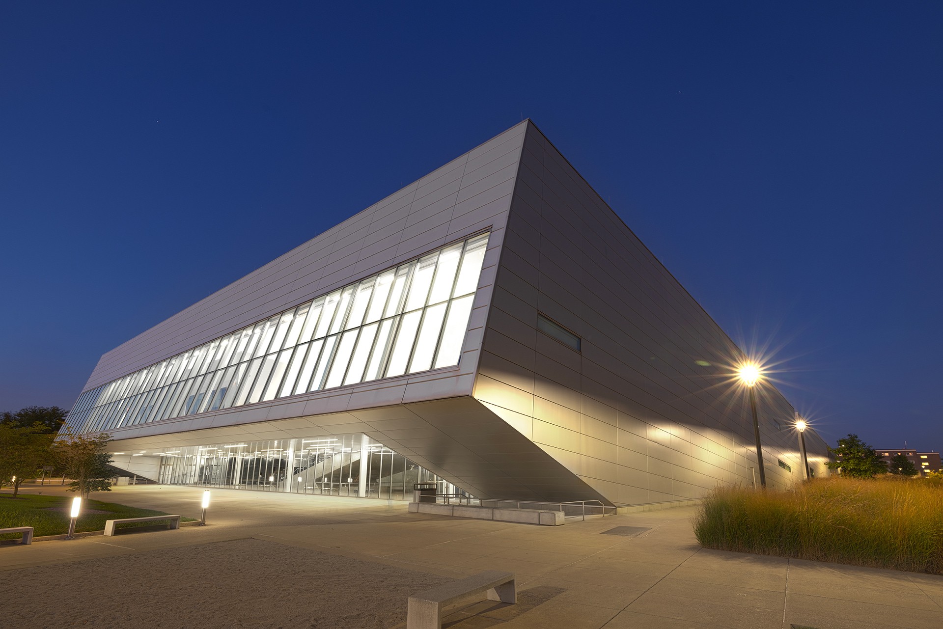 A musical building shown at night.
